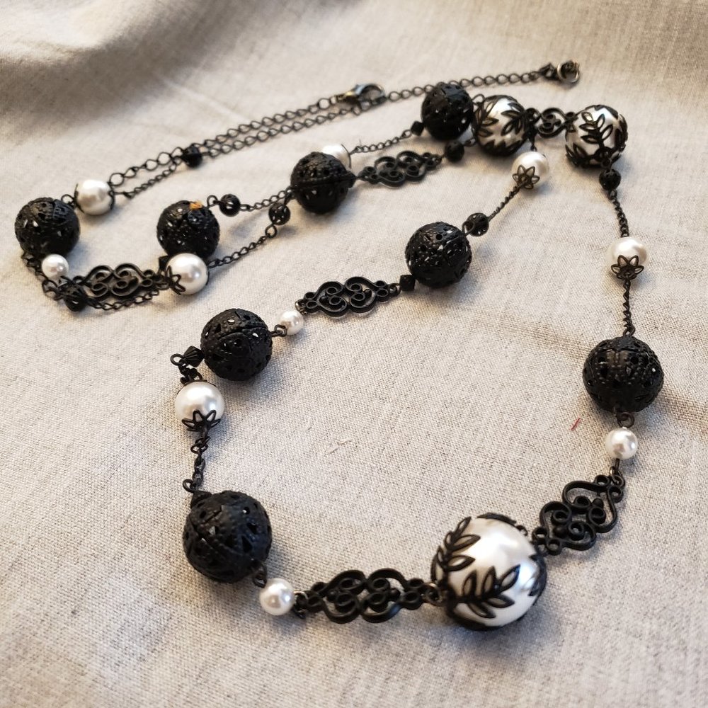 Delicate art nouveau orbs with faux pearl necklace